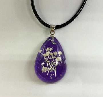 Real Flowers Pendant Necklace Encased in Resin that Glows in the Dark